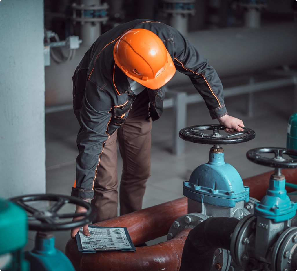 Man opening valve