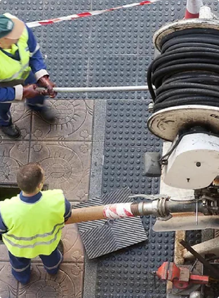 Worker sewer jetting